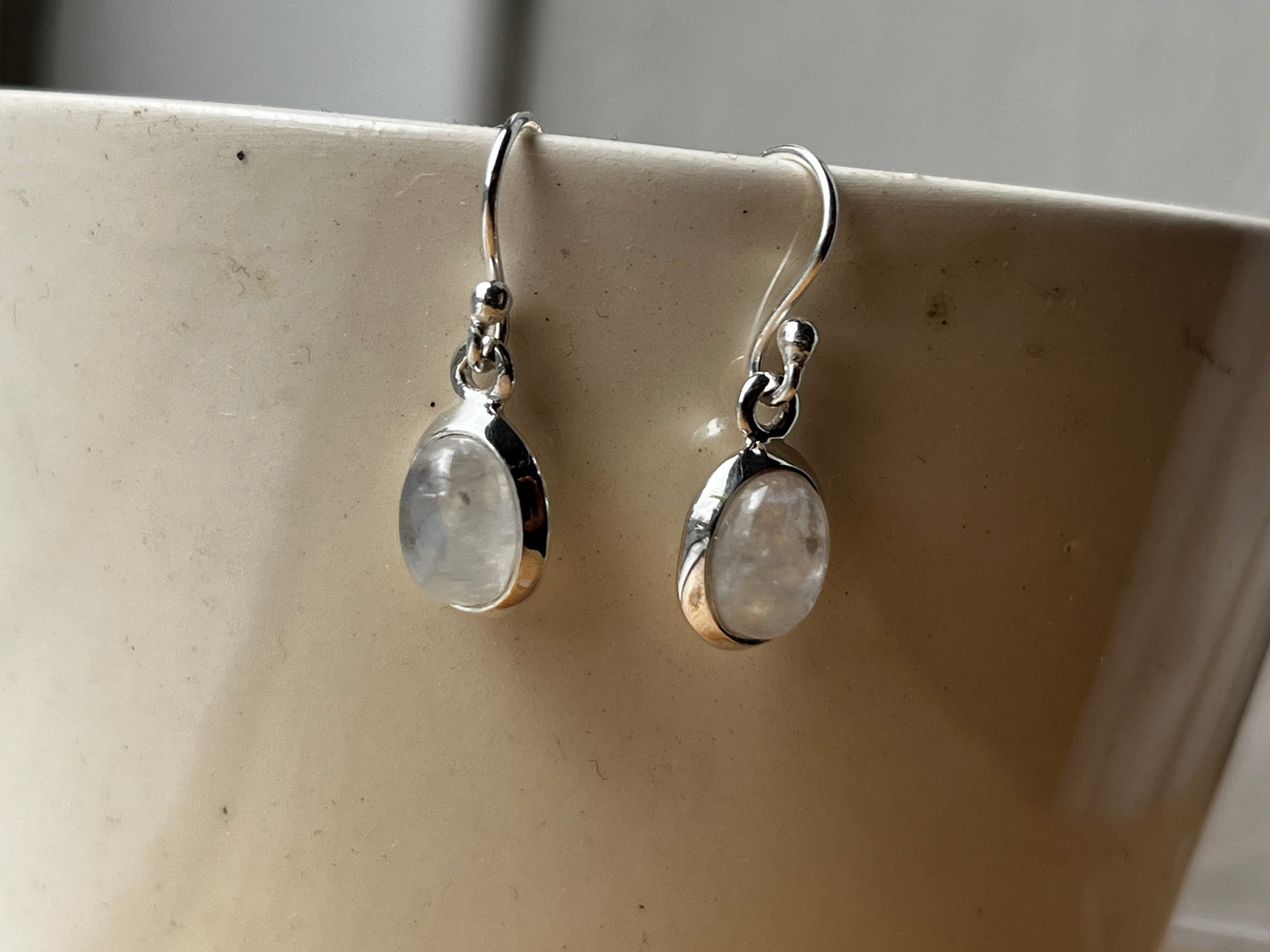Oval Moonstone Sterling Silver Drop Earrings by Tiger Lily London.&nbsp;