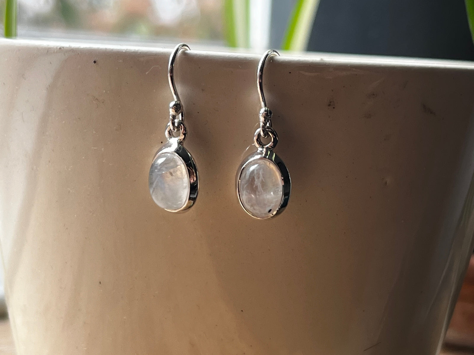 Oval Moonstone Sterling Silver Drop Earrings by Tiger Lily London.&nbsp;