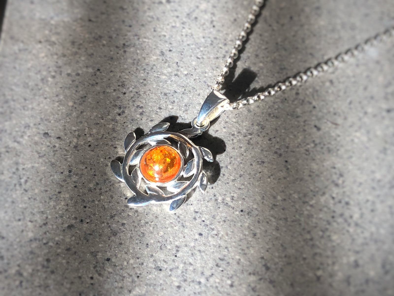 Baltic Amber Spinning Wheel Silver Pendant