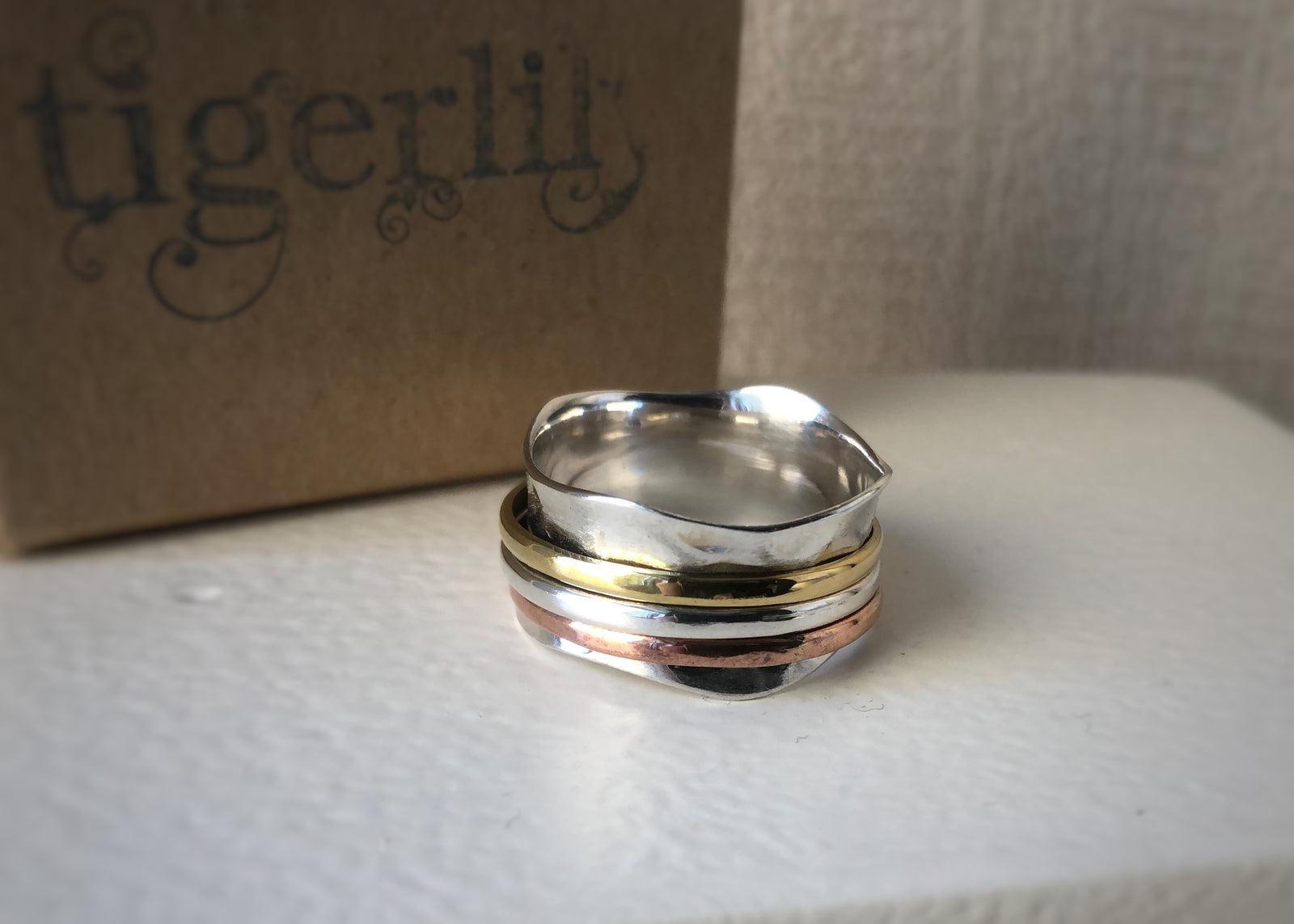 Brass, Copper and Sterling Silver Tri-Color Wave Spinning Ring Tiger Lily London