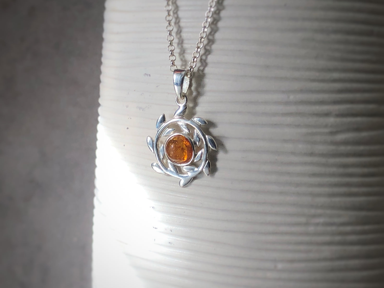 Baltic Amber Spinning Wheel Silver Pendant